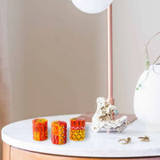 Three hand-painted votive candles in eco-friendly gift box