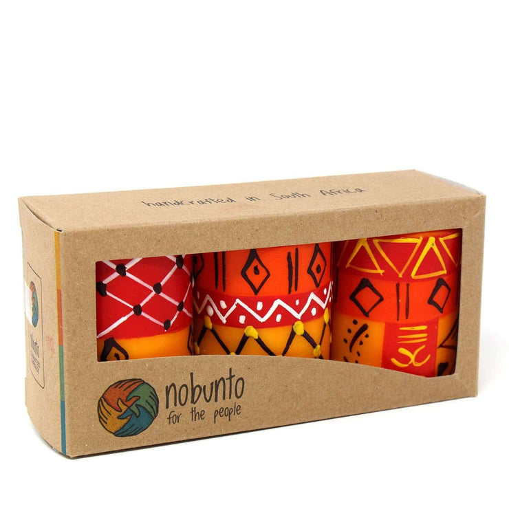 Set of three unscented candles featuring detailed hand-painted designs