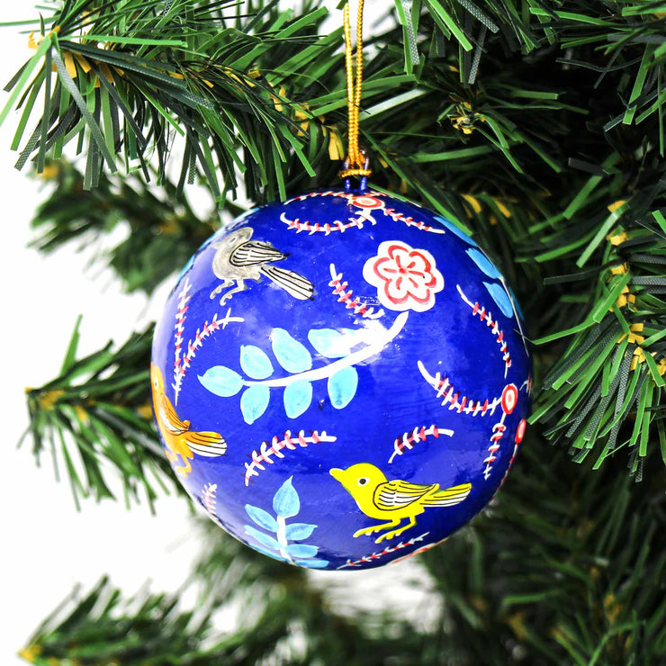 Set of two papier-mâché ornaments handcrafted in India and hand-painted with traditional folk designs for fair trade holiday décor christmas