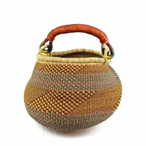 “Side view of Ghana handwoven Bolga basket, showcasing elephant grass weave and handle”