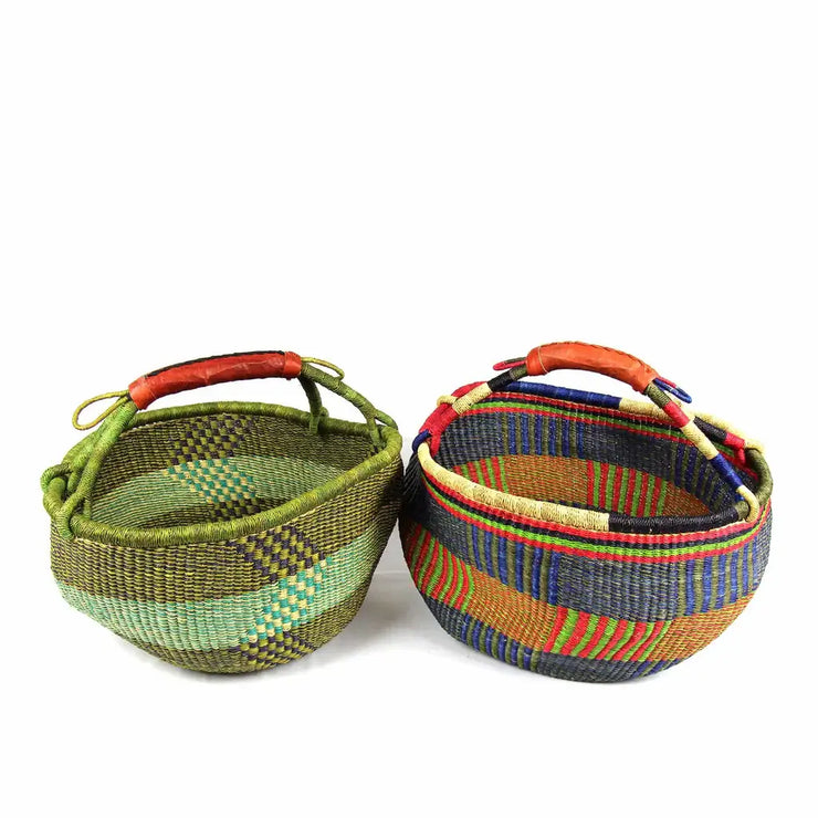 Overhead shot of two multicolor Bolga pot basket, artisan crafted and unique pattern”