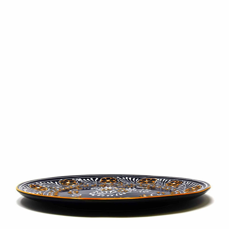 Two hand-painted blue ceramic dinner plates in boho style