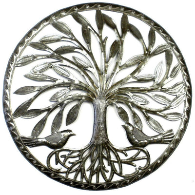 Sustainable artisan-made Tree of Life wall decor accentuating a clean white interior.