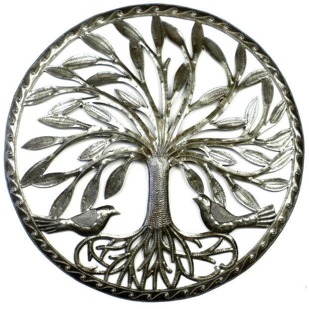 Sustainable artisan-made Tree of Life wall decor accentuating a clean white interior.
